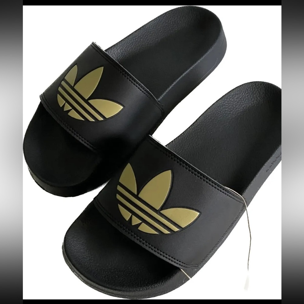 NEW!! Adidas Adilette Lite Women’s Black and Gold Slide Sandals Size 6 $35.00
